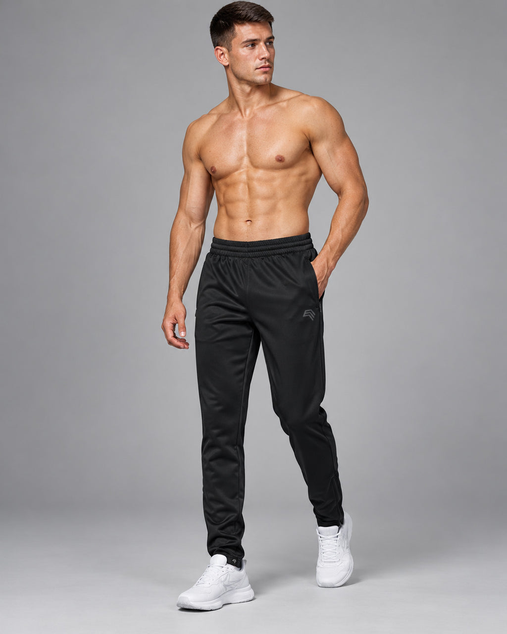 KRB P189 Trainingshose in Schwarz von vorn – Unisex Sporthose mit geradem Schnitt, Elastikbund und seitlichen Reißverschlusstaschen