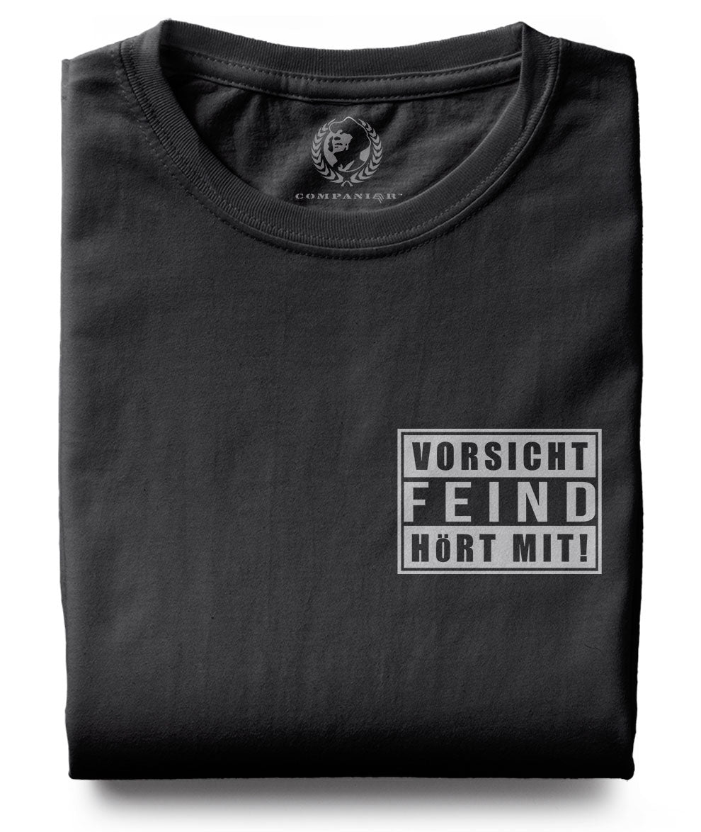 Vorsicht Feind hört mit ― T-Shirt - Schwarz